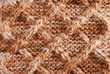 Close-up of knitted cloth with geometrical pattern Close-up of knitted cloth with geometrical pattern