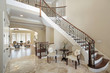 Foyer with curved staircase
