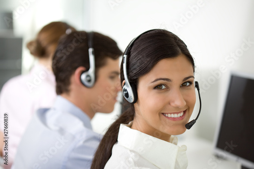 Photo: Young adults working in a call center Young adults working in a call center