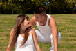 young couple happy sit on grass white clothes, love relationship
