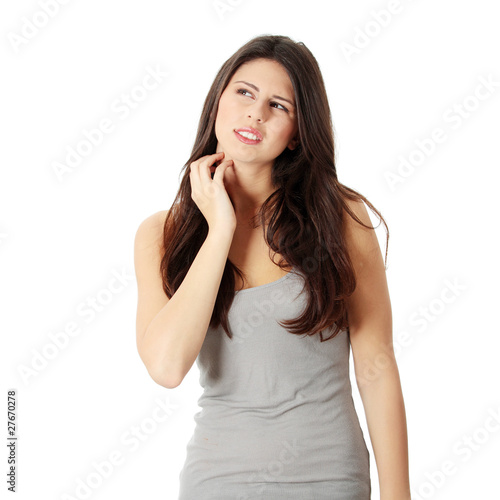 Foto: Woman scraching her self Woman scraching her self