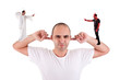 man holding fingers in his ears, devil and angel