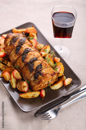Photo: Roast pork with sage and thyme sauteed potatoes and spiced apple Roast pork with sage and thyme sauteed potatoes and spiced apple