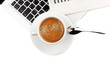 Cappuccino cup on laptop. Above view Cappuccino cup on laptop. Above view