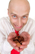 Businessman with pile of coins