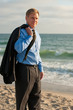attractive business man on beach