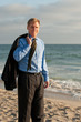 attractive business man on beach