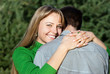 Beautiful mature woman hugging her husband with love