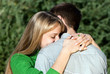 Beautiful mature woman hugging her husband with love