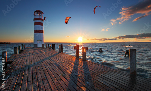 Photo: Lighthouse in Lake Neusiedl at sunset - Lower Austria Lighthouse in Lake Neusiedl at sunset - Lower Austria