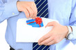 Businessman is sending a pre-approved credit card by mail Businessman is sending a pre-approved credit card by mail