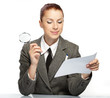woman holding a magnifying glass in the hand woman holding a magnifying glass in the hand
