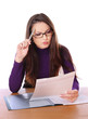 pretty woman is reading document and thinking pretty woman is reading document and thinking