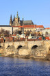View on the autumn Prague gothic Castle with the Charles Bridge