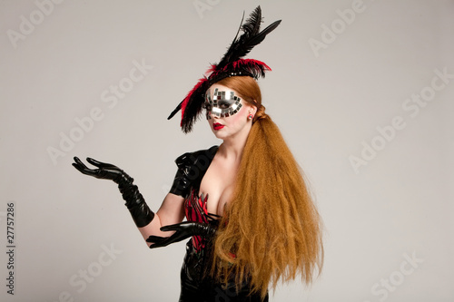 Photo: Long haired woman in mask Long haired woman in mask