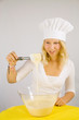 Foto: girl prepares cookies girl prepares cookies
