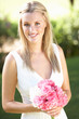 Bride Wearing Dress Holding Bouqet At Wedding Bride Wearing Dress Holding Bouqet At Wedding