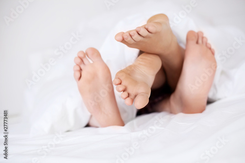 Photo: feet of a couple feet of a couple