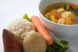 Vegetable and Soup in distance