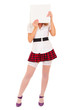 Sexy girl in stockings and short skirt holds blank paper sheet
