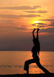 Photo: Yoga at sunset by the ocean Yoga at sunset by the ocean