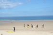 Surfers on a Beach