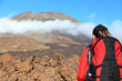 Woman hiking looking at mountain