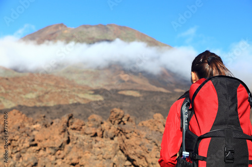 Photo: Woman hiking looking at mountain Woman hiking looking at mountain