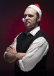 Photo: Horror Christmas Elf. Makeup and blood splash on his face. Horror Christmas Elf. Makeup and blood splash on his face.