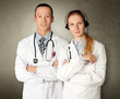 two doctors smiles at camera