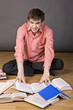 young boy reading a book