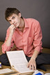 young boy reading a book