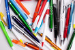 Colored pens on table Colored pens on table