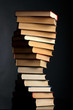 Pile of books on a black background Pile of books on a black background