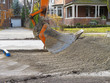 Backhoe on residential street