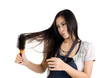 Photo: woman brushing her hair woman brushing her hair