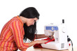 Seamstress work on the sewing-machine