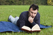 Photo: Young Adult Reading at the Park Young Adult Reading at the Park