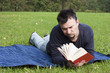 Photo: Young Adult Reading at the Park Young Adult Reading at the Park