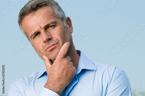 Photo: Perplexed mature man Perplexed mature man
