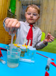 A boy plays in the scientist chemist A boy plays in the scientist chemist