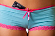 Close-up of woman panties with condom