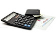 dollars, calculator, graphs and purse
