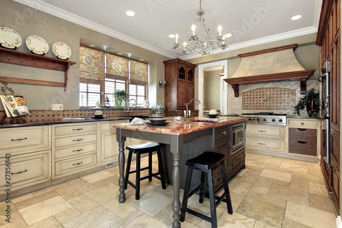 Photo: Kitchen with granite island Kitchen with granite island