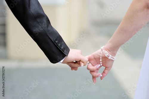 Photo: Bride and groom walking together Bride and groom walking together