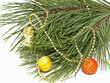Christmas balls on a pine branch.