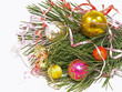 Christmas balls on a pine branch.