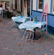 fall empty simplicity cafe on the sidewalk with autumn leafs fall empty simplicity cafe on the sidewalk with autumn leafs
