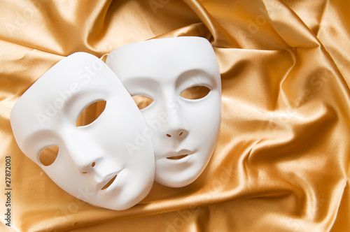 Photo: Theatre concept with the white plastic masks Theatre concept with the white plastic masks