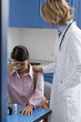 Doctor consoling patient